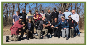 Group of Seminarians pose for a picture at their retreat to Lake of the Ozarks with Fr. Paul, OSB